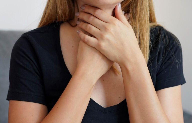 Woman with a sore throat