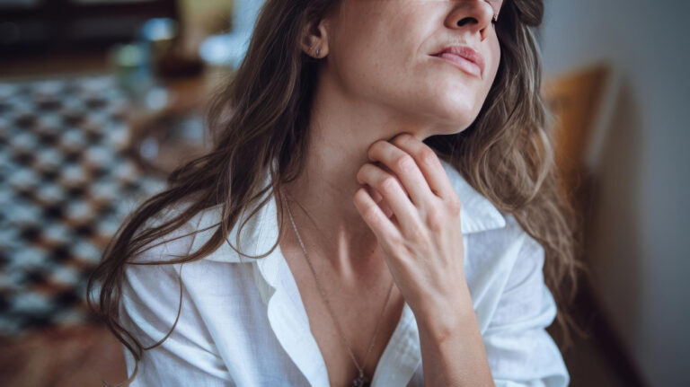 woman experiencing an allergic reaction